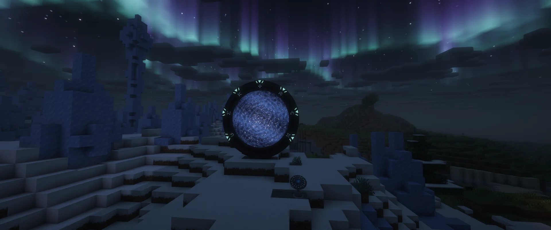 An open Stargate in the snow beneath the aurora