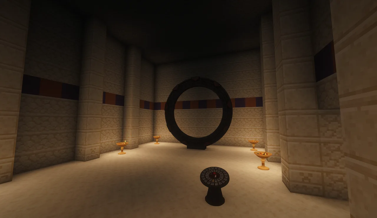 The gate hall of the pyramid, lit by braziers, with the Stargate and a DHD